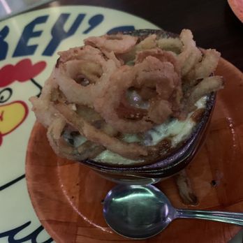 Rickey's Restaurant & Lounge - Onion soup is topped with onion rings! - Sports Bars Near Me - Hollywood, Florida