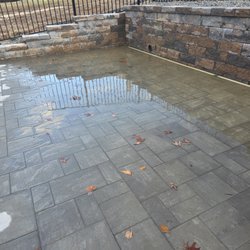 Composite Pools USA - Patio hold water and the installer covered the drain.