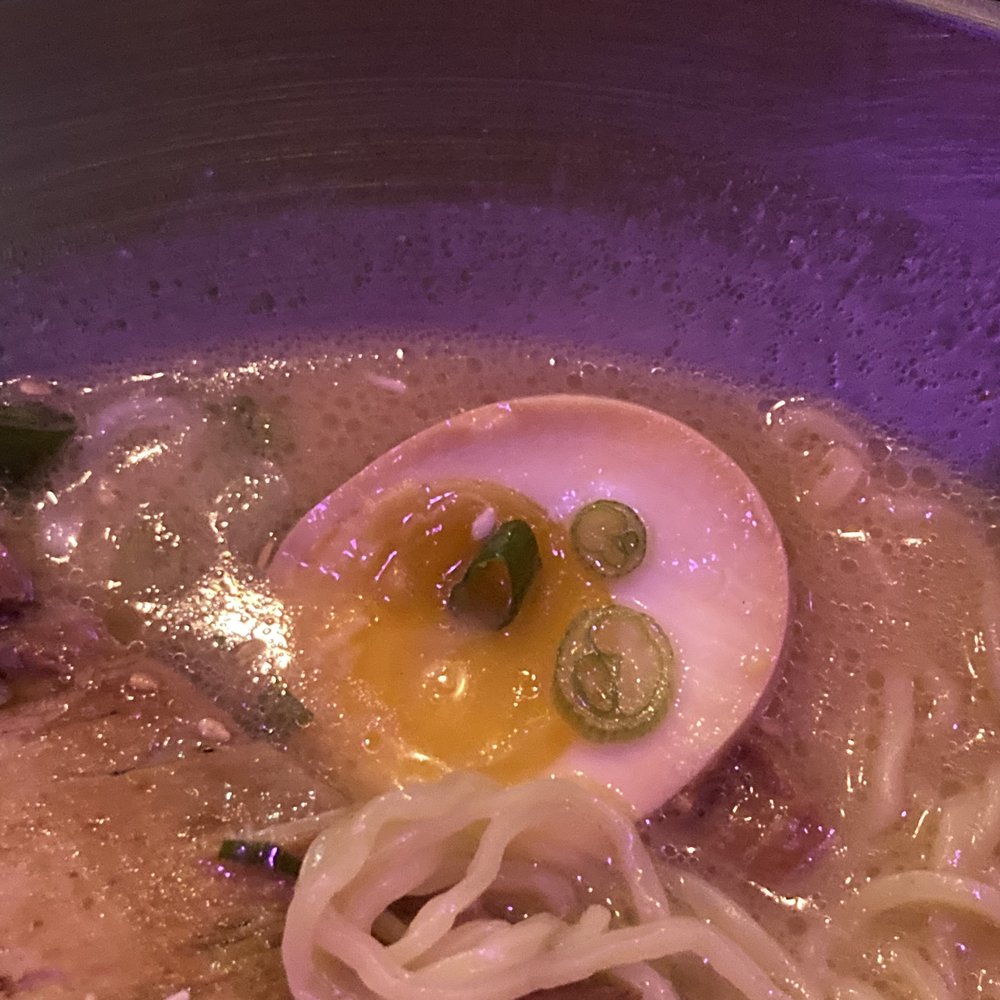 Nomiya - Close up of that gooey egg in my tonkotsu ramen. - Ramen Near Me - New Orleans, Louisiana