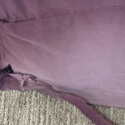 Old, fraying and discolored bed skirt, which caused be to get my foot tangled up and I fell. Old, fraying and discolored bed skirt, which caused be to get my foot tangled up and I fell.
