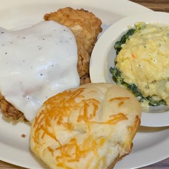 Cast Iron Grill - Chicken fried chicken with broccoli and rice. - Breakfast & Brunch Near Me - Lubbock, Texas