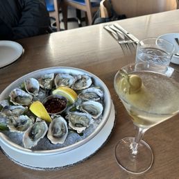 Dozen oysters and martini.