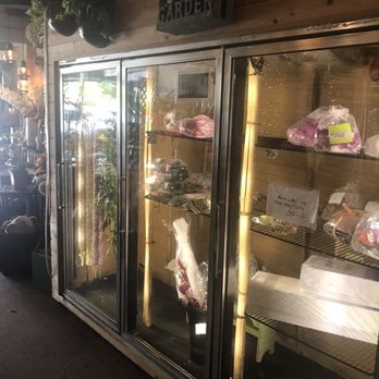 Picket Fence Florist - Many orders already labeled in the fridge & several beautiful lei - Florists Near Me - Kailua, Hawaii Picket Fence Florist - Many orders already labeled in the fridge & several beautiful lei - Florists Near Me - Kailua, Hawaii