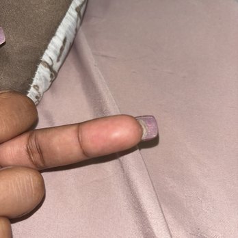Aquis Body Spa - That's gel powder under my nail, usually they clean it out but idk. - Massage Near Me - New York, New York