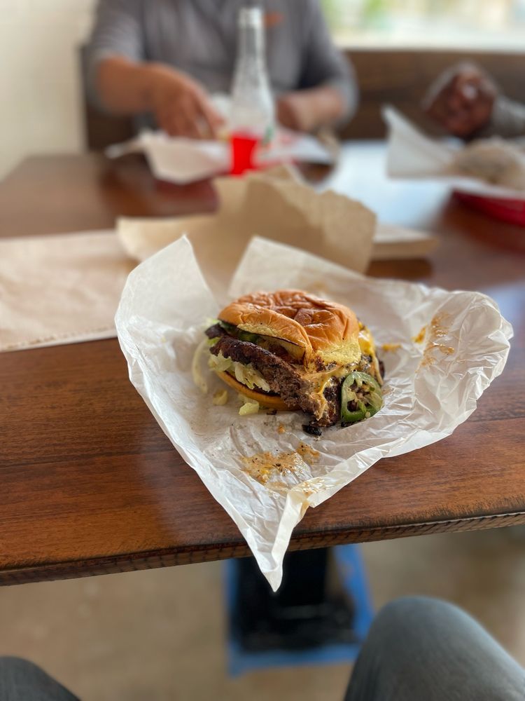 Woody's Hamburgers Logo