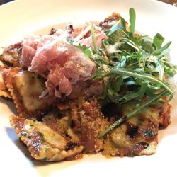 PASTARAZZI Spezialitäten & Take-away - Amazing Swiss cheese ravioli and asparagus ravioli in a tomato sauce with Italian shaved prosciutto