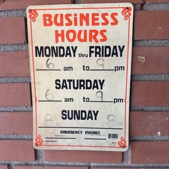 Maico - Business Hours - Sign showing business hours from Monday to Sunday, with handwritten times indicating opening and closing hours. - Mexican Near Me - Tucson, Arizona