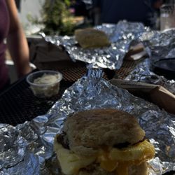 Mr Biscuits Bakery - Sausage egg cheese biscuit . Honey butter