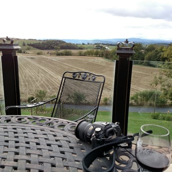 Bluestone Vineyard - Sipping a glass of bluestone wine on the patio. - Wineries Near Me - Bridgewater, Virginia