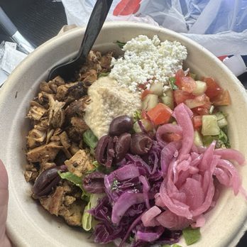 The Kebab Shop - This is the Get Greeky bowl and I love it! I got mine with truffle brown rice, chicken shawarma, hummus, olives, and feta cheese. - Mediterranean Near Me - San Marcos, California