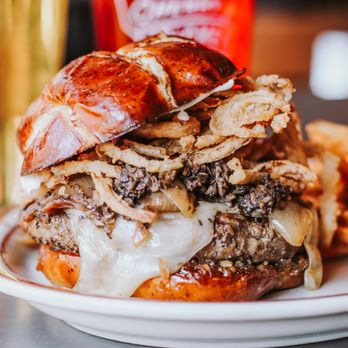 Cherry Cricket - Cherry Creek - a burger and french fries on a plate - Burgers Near Me - Denver, Colorado