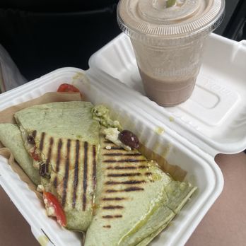 Kale Me Crazy - Veggie quesadilla with pesto and the Go Getter peanut butter smoothie!! So good!!! - Juice Bars & Smoothies Near Me - Tampa, Florida