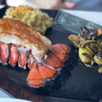 Rogue's Manor - Lobster tail with veggies - Seafood Near Me - Eureka Springs, Arkansas Rogue's Manor - Lobster tail with veggies - Seafood Near Me - Eureka Springs, Arkansas
