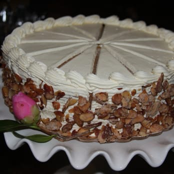 Posh Bagel. - a cake on a cake stand - Bakeries Near Me - Santa Clara, California