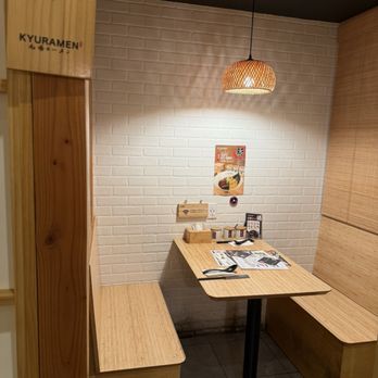 Kyuramen - Union Square - Booths in the back of restaurant. - Ramen Near Me - New York, New York