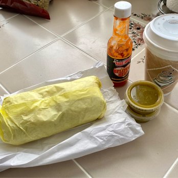 Tom’s Chino - Tom's Burrito with green salsa on the side. Also, self provided Belizean Heat sauce to kick up the flavor. - American Near Me - Chino, California Tom’s Chino - Tom's Burrito with green salsa on the side. Also, self provided Belizean Heat sauce to kick up the flavor. - American Near Me - Chino, California