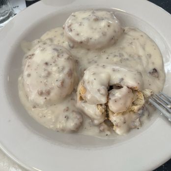 The Monument Café - This is the side order of biscuits and sausage gravy! The biscuits were huge and fluffy in the sausage gravy was yummy! - American Near Me - Georgetown, Texas