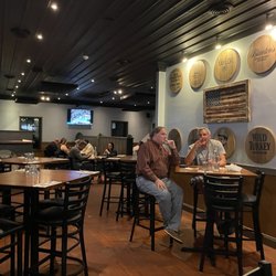 Barrel House Restaurant and Bar - Main dining area with a few high tops.