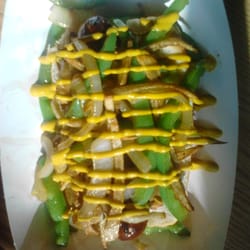 Bitez on the Fly - Game day Honker Dog! Sausage, grilled onion/green peppers, shoestring potatoes and mustard.