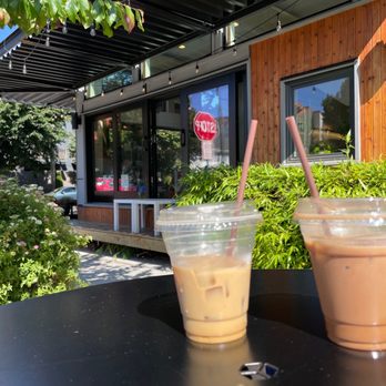 Olympia Coffee - two cups of iced coffee on a table - Coffee & Tea Near Me - Seattle, Washington