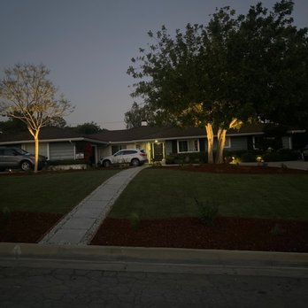 Green Grass Landscaping - a house with a car parked in front of it - Landscaping Near Me Green Grass Landscaping - a house with a car parked in front of it - Landscaping Near Me