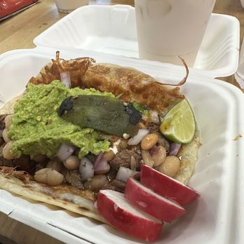 Perro Exquisite Taco - This is their Perro taco which is based on a Sonora style tacos. - Tacos Near Me - Cerritos, California