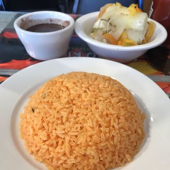 Casa Adela - Arroz y abichuelas (black beans) and a plate of Yuca done Puerto Rican style ~ - Latin American Near Me - New York, New York Casa Adela - Arroz y abichuelas (black beans) and a plate of Yuca done Puerto Rican style ~ - Latin American Near Me - New York, New York
