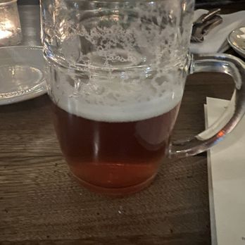 True History Brewing - a glass of beer on a table - Breweries Near Me - Toronto, Ontario
