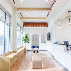 Riviera Family Dentistry - Spacious and comfortable waiting area designed to provide a relaxing and welcoming environment for every patient.