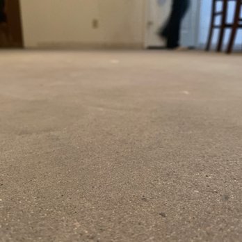 Floor Dozers - See the smoothness?! Who would have thought there was nasty old tile stuck to our slab? - Flooring Near Me - Mesa, Arizona