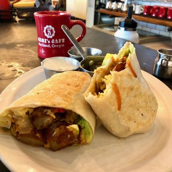 Gigi's Cafe - Grilled breakfast burrito served with sour cream and salsa verde on the side - Cafes Near Me - Portland, Oregon Gigi's Cafe - Grilled breakfast burrito served with sour cream and salsa verde on the side - Cafes Near Me - Portland, Oregon