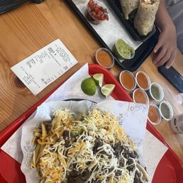 Cali burrito + sour cream and carne asada fries Cali burrito + sour cream and carne asada fries