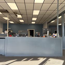 Village Tag Agency - More computers and ID area behind the desk in the back