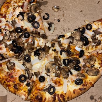 Domino's Pizza - a half eaten pizza in a box - Pizza Near Me - Tavernier, Florida Domino's Pizza - a half eaten pizza in a box - Pizza Near Me - Tavernier, Florida