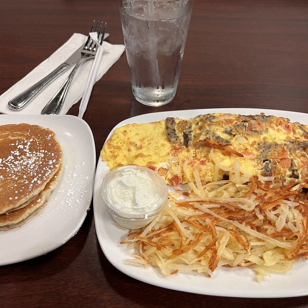 Brunch Cafe - a plate of breakfast food and a glass of water - American Near Me - Livonia, Michigan Brunch Cafe - a plate of breakfast food and a glass of water - American Near Me - Livonia, Michigan