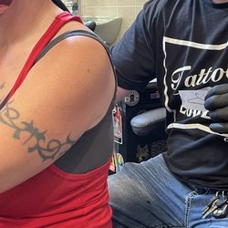 Skin Hooked Tattoo
