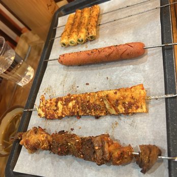 Dynasty BBQ - Veggie egg-rolls, link, pork and chicken skewers - Chinese Near Me - Newark, California Dynasty BBQ - Veggie egg-rolls, link, pork and chicken skewers - Chinese Near Me - Newark, California