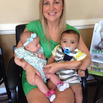 Spine Fix - Our Clinic Director, Cynthia, playing with patient's babies while they get treatment with our amazing practitioners! - Chiropractors Near Me - Richmond, Virginia Spine Fix - Our Clinic Director, Cynthia, playing with patient's babies while they get treatment with our amazing practitioners! - Chiropractors Near Me - Richmond, Virginia