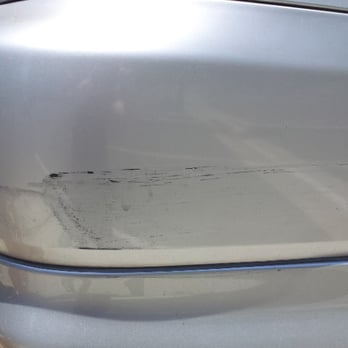 Quigleys Auto Body - "Before" - This is one of the scraped up areas on the car caused by the auto relocation company. - Body Shops Near Me - Lake Forest, California
