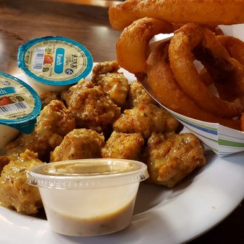 Dick's Wings And Grill Starke - 10 Boneless Wings and Onion Rings - Chicken Wings Near Me - Starke, Florida Dick's Wings And Grill Starke - 10 Boneless Wings and Onion Rings - Chicken Wings Near Me - Starke, Florida