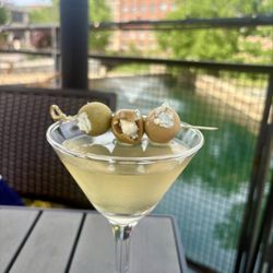 Kau Greensboro - Dirty Vodka Martini with house stuffed blue cheese olives