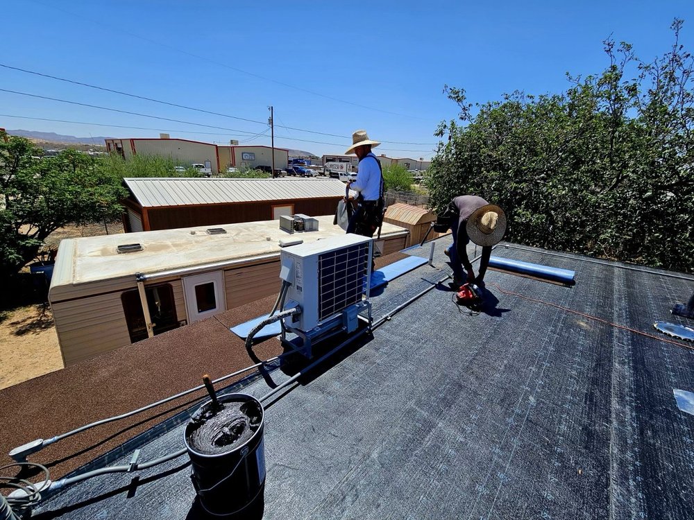 Slide of Sagan Commercial Roofing