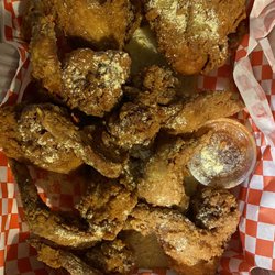 Clucker Basket sprinkled w/Parmesan Magic on top and special secret hot sauce on the side!!!