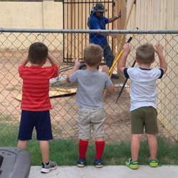Nothing says fun to little boys like getting to see someone build something cool. Improving our outdoor play area with a sturdy fence.