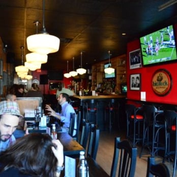 The Mugshot Tavern - people sitting at the bar - Bars Near Me - Toronto, Ontario