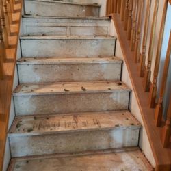 Odell's Handyman Services - Before - Vinyl installation on stairs