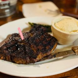 Tejas Steakhouse and Saloon - Ribeye steak, whipped mashed potato, grilled asparagus