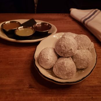 Sotto - Ricotta doughnuts w/ three sauces...I think it's chocolate, caramel and pistachio - Italian Near Me - Cincinnati, Ohio Sotto - Ricotta doughnuts w/ three sauces...I think it's chocolate, caramel and pistachio - Italian Near Me - Cincinnati, Ohio