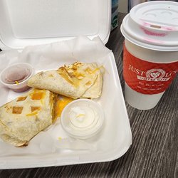 Just Love Coffee Cafe - Breakfast burrito and cappuccino.