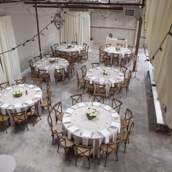 The Peyton - Round tables and wooden cross-back chairs included!  Photography: Innamorata Photography